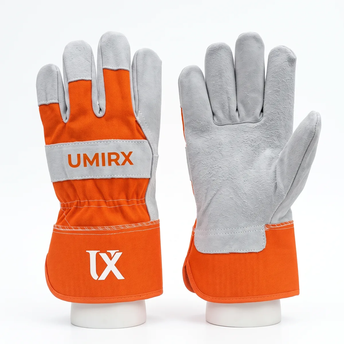 Canadian rigger gloves with a grey split leather palm and an orange canvas back
