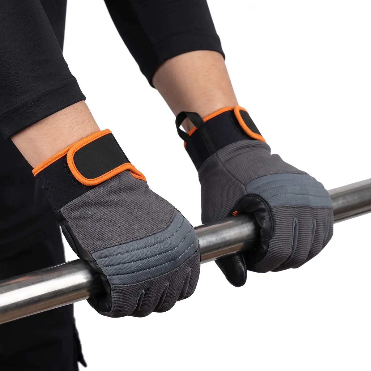 Hands in grey tactical gloves gripping a bar
