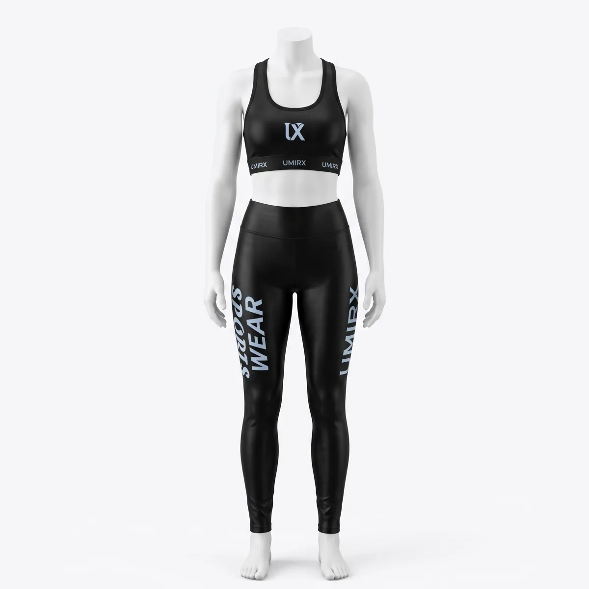 Black leggings and a sports top with orange trim